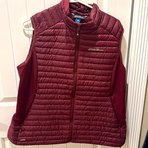 Eddie Bauer women’s XL down vest.  Brand new, never worn